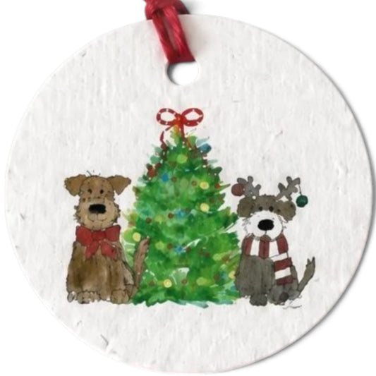 Charter Oak Creations round plantable seed paper gift tag featuring two dogs and a decorated Christmas tree