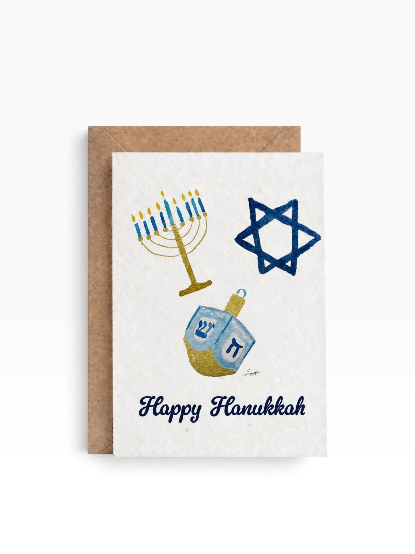 Charter Oak Creations plantable Hanukkah seed card with watercolor menorah, Star of David, and dreidel illustration.