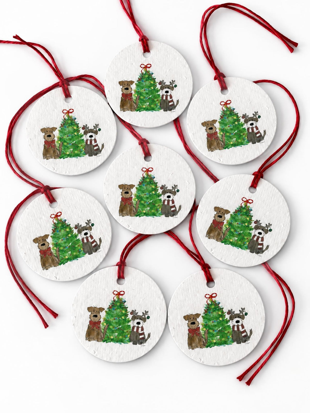 Charter Oak Creations set of 8 round plantable seed paper gift tags featuring watercolor dogs and a Christmas tree.